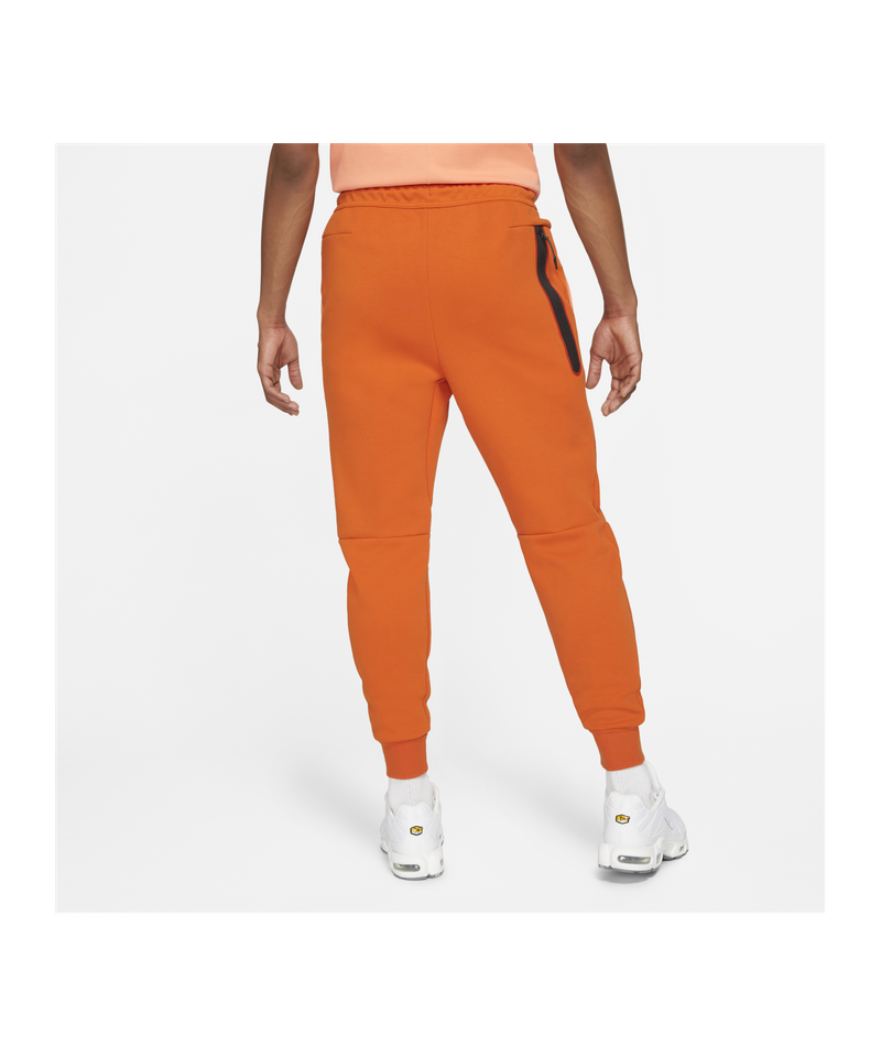 nike tech pants orange