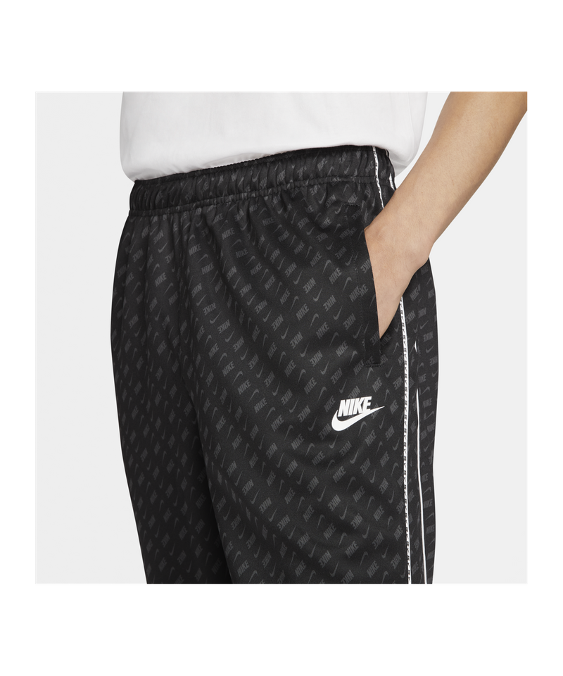 Nike repeat best sale print track pants