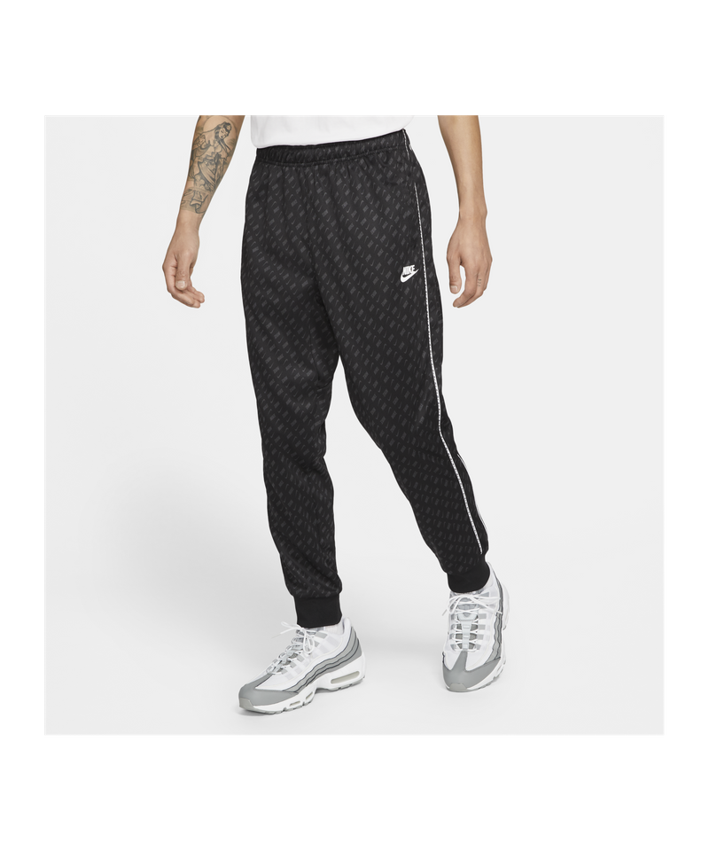 Nike repeat print sales track pants